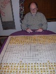 Tai Shogi: player's eye view.  Tongs are used to reach across the board.